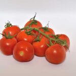 9 rijpe tomaten, klaar om in te vriezen.